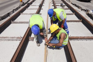 40562083 - railway workers on a construction site in a street