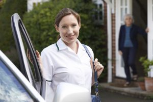 46779388 - female care worker visiting senior woman at home